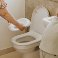 Nuby Sedile di sicurezza per WC con protezione antispruzzo integrata