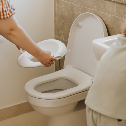 Nuby Siège de toilette de sécurité avec protection anti-éclaboussures intégrée