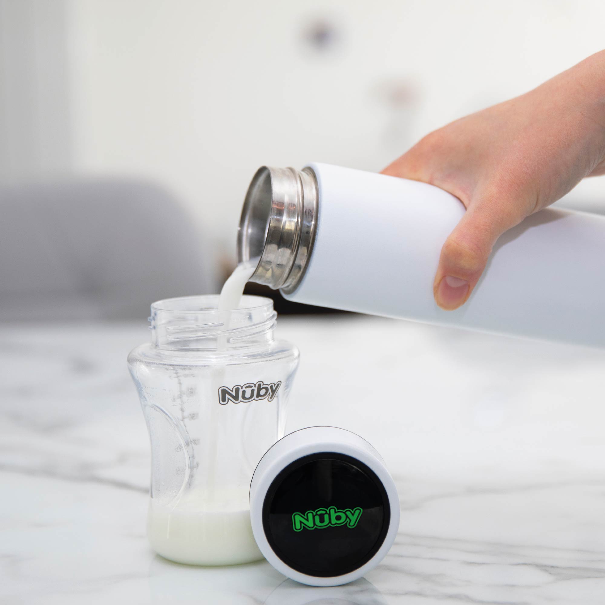 Nuby - RapidCool™ - Prépare la nourriture parfaite pour bébés en seulement 2 minutes