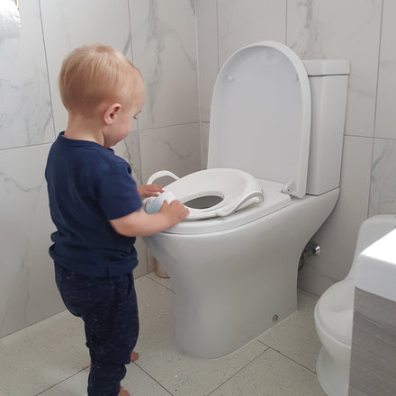 Nuby Siège de toilette de sécurité avec protection anti-éclaboussures intégrée